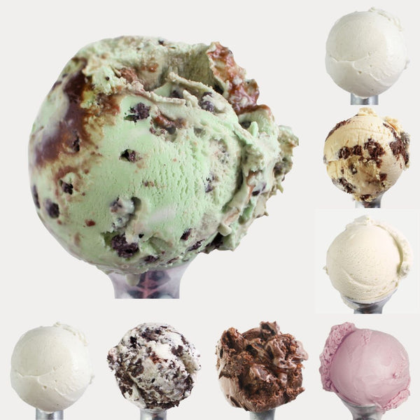 Collection of ice cream scoops in various flavors on a white background
